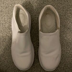 White slip on nursing clogs